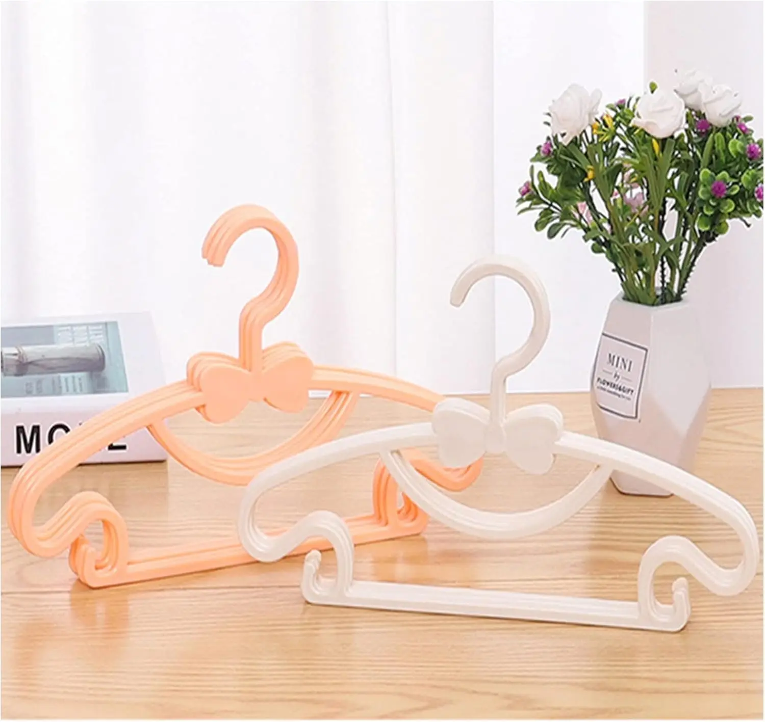 Baby-Kleiderständer aus Kunsts – Baby Clothing Display Bewertung und Preis